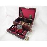 A rexin covered jewellery box with key,