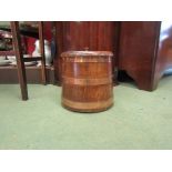 A mid Century oak coppered biscuit barrel