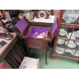 An Edwardian inlaid mahogany sewing box with a secret drawer and contents