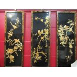 A trio of Oriental wall hangings with resin birds and foliage, 92cm x 30cm,