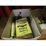 A box containing assorted fishing gear including coarse and sea fishing,