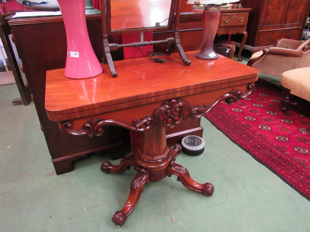 A William IV flame mahogany card table,