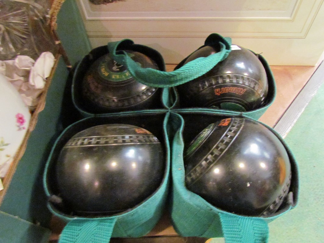 A set of Almark Sterling slim line lawn bowls,