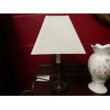 A pair of table lamps as chamber sticks and candles, with shades,