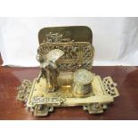 A brass Oriental style desk tidy including letter rack and ink well