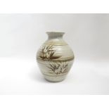 A large Aller Pottery urn form vase, oatmeal glaze with brushwork foliate detail.