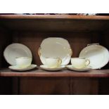 Three Grosvenor tea cups and saucers,