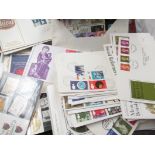 A selection of over 70 First Day Covers including presentation packs