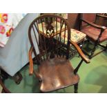 A circa 1860 style oak and elm Windsor elbow chair with Prince of Wales feathers fretwork