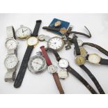 A quantity of ladies and gents wristwatches and three pocket watches