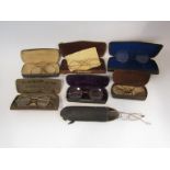 A box of mixed cased spectacles