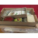 A box of mixed tea cards and silks including mixed scrapbook items
