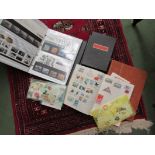 A quantity of first day cover albums, collectors' stamps,