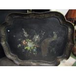 A large 19th Century papier mache shaped edge tray, hand painted with flora and fauna,