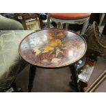 A Victorian three leg table with hand painted top, 40cm high,