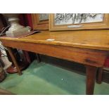 An Arts & Crafts oak bench in the manner of "Liberty & Co",