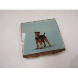 A square form Stratton enamel compact of an Airedale dog