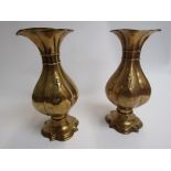 A pair of late 18th Century/early 19th Century ecclesiastical brass altar vases, baluster form.