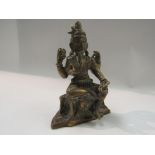 A Tibetan brass deity,