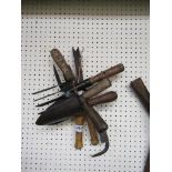 Six garden hand tools including trowel