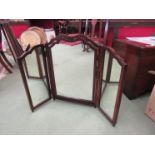A circa 1920 mahogany dressing table triple mirror on turned feet,