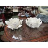 A pair of ivory ceramic lotus flower form candle holders, approx.