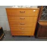 A 1960's retro teak chest of five straight drawers,