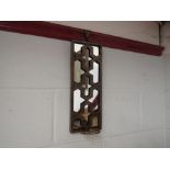 A gilt painted metal wall mirror candle sconce,