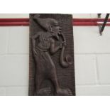 An African wood carving depicting ethnic man,