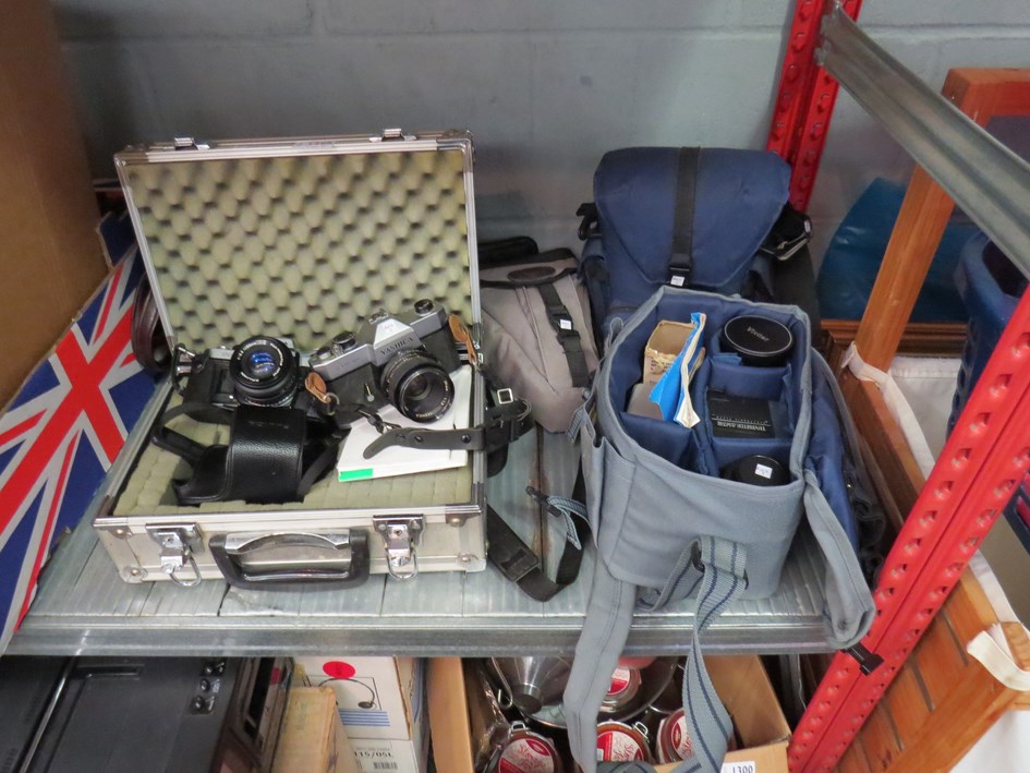 A quantity of cameras and lenses, including Yashica TL Electro, cased, Fujica AX-1, cased,