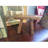 An African stool and another stool