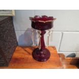A pair of red glass Victorian lustres with drops