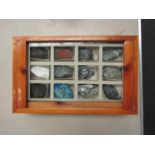 A collection of minerals in display case "Vesuvio 1944"