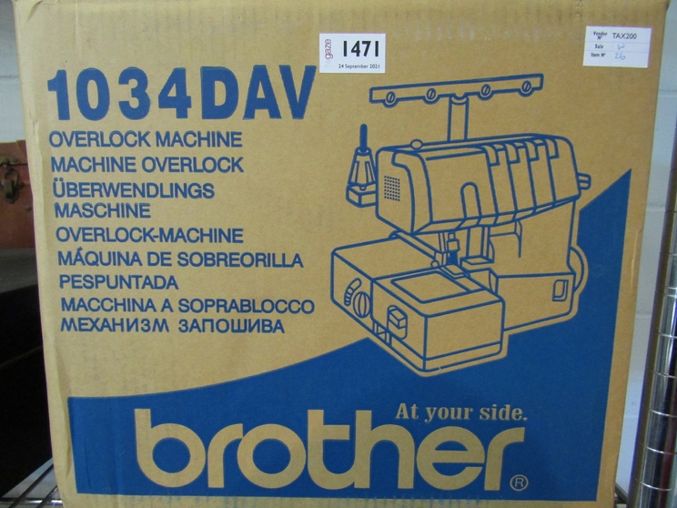 A boxed Brother Overlock sewing machine