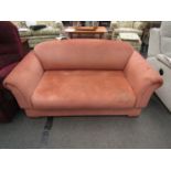 A Parker Knoll sofa bed with drop ends and back