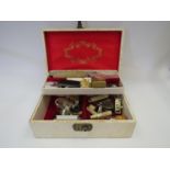 A jewellery box with contents