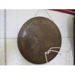 An Oriental bronze gong with dragon detail,