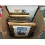 A box containing assorted pictures and prints,