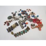 A box of white metal and ethnic jewellery including coral etc