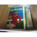 A box of football testimonial programmes including Denis Law, Gordon Banks,