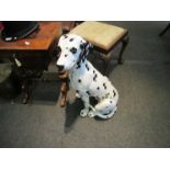 A ceramic figure of a Dalmatian dog,