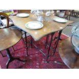 A 19th Century gateleg table with shaped leaves and slender turned supports to pad feet