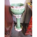 A green and pink glazed ceramic jardiniere on stand, marked Blakeney to base,