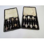 Two cased sets of silver spoons