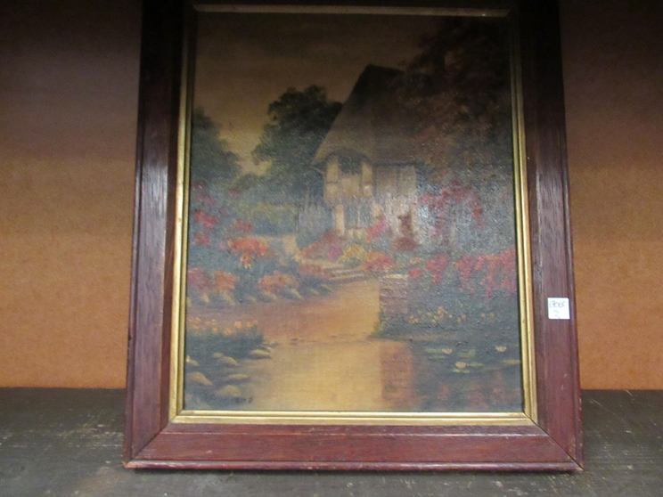 An image on board depicting a thatched cottage by a river, dated 1944 verso,