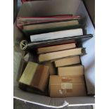 A box of stamp albums and stock books including boxes of stamps sorted into countries
