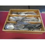 A cutlery tray and contents