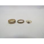 A 9ct white gold and yellow gold eternity ring,