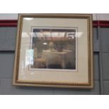 A print after Henri Le Sidaner of an exterior dining scene, framed and glazed,