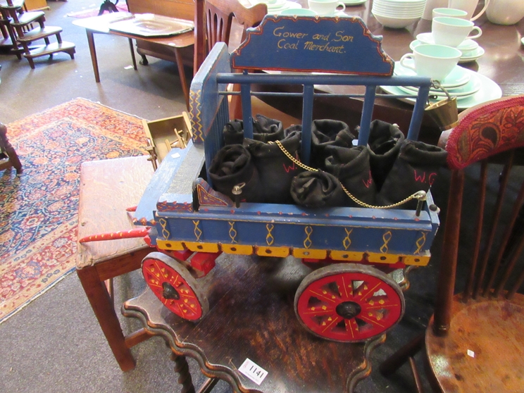 A handpainted "Gower & Son" coal merchant wagon together with a brass horse cart